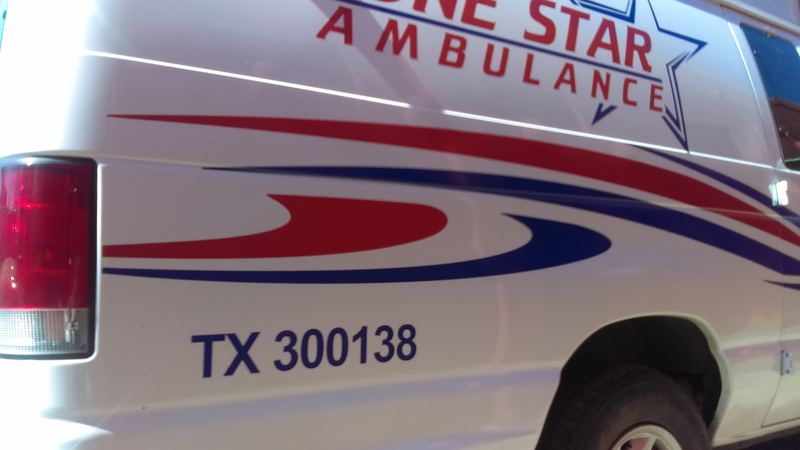 Ambulance with custom vinyl striping and unit number lettering