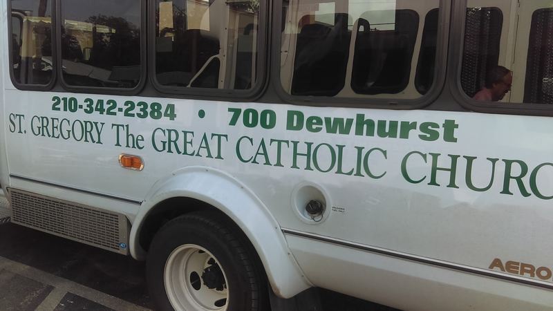 Church shuttle bus with vinyl lettering along the side panel