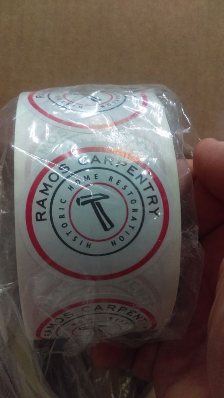 Roll of custom printed round business decals