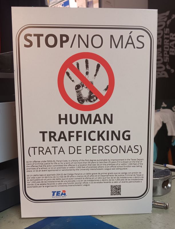 Bilingual human trafficking notice compliance sign