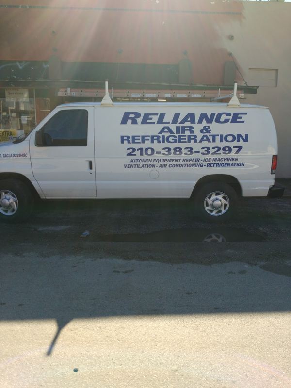 Air conditioning and refrigeration van with vinyl lettering