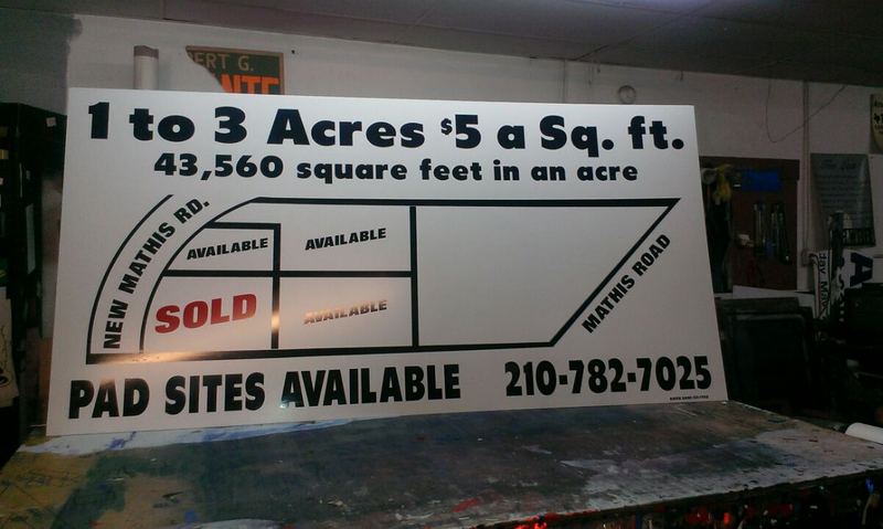 Acreage land for sale sign with a Sold rider panel