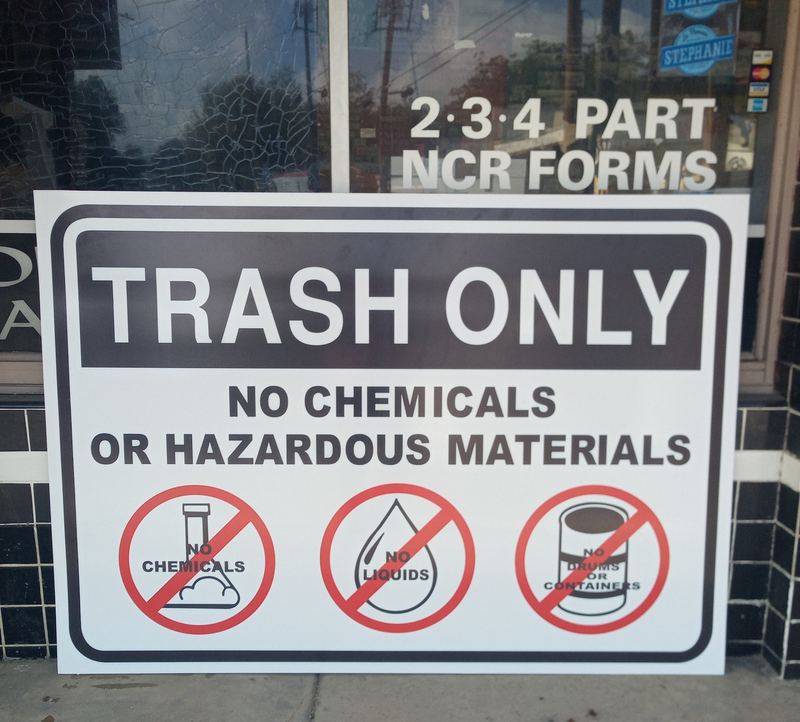 Trash only facility sign with no chemicals or hazardous materials