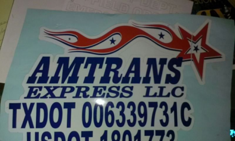 TXDOT and USDOT number decals applied to a truck door